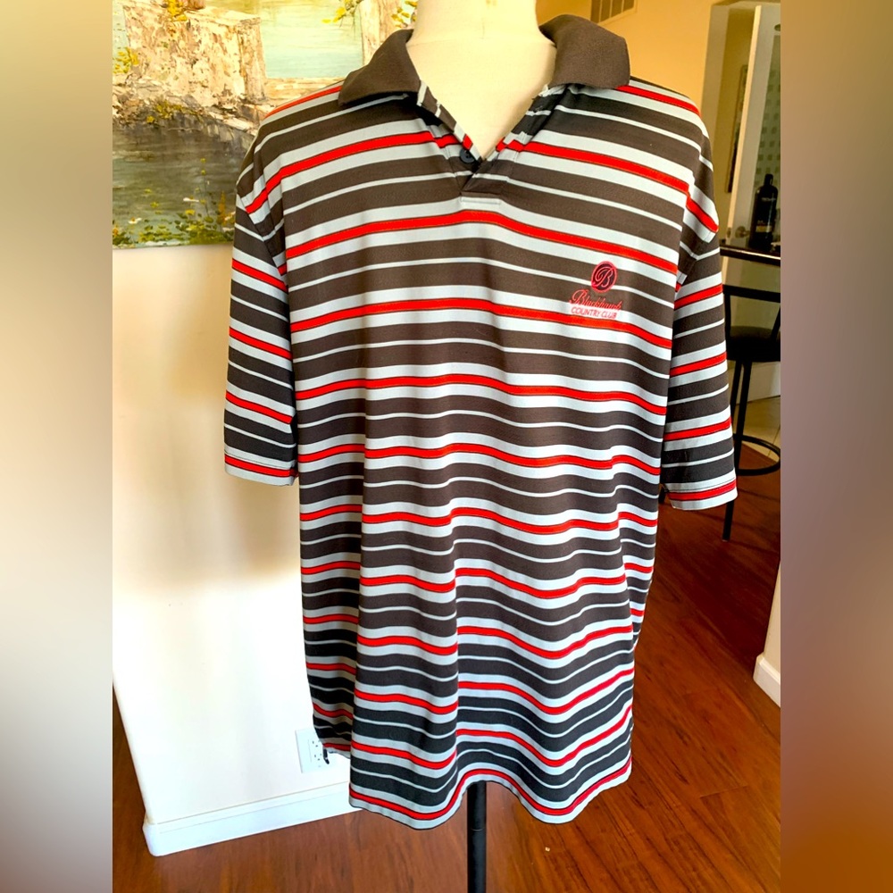 BUNDLE 3@8 for $15.00 Man’s stripped polo shirt by Under Armour .